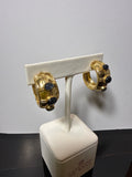 Gold and Lapis Blue statement earrings.