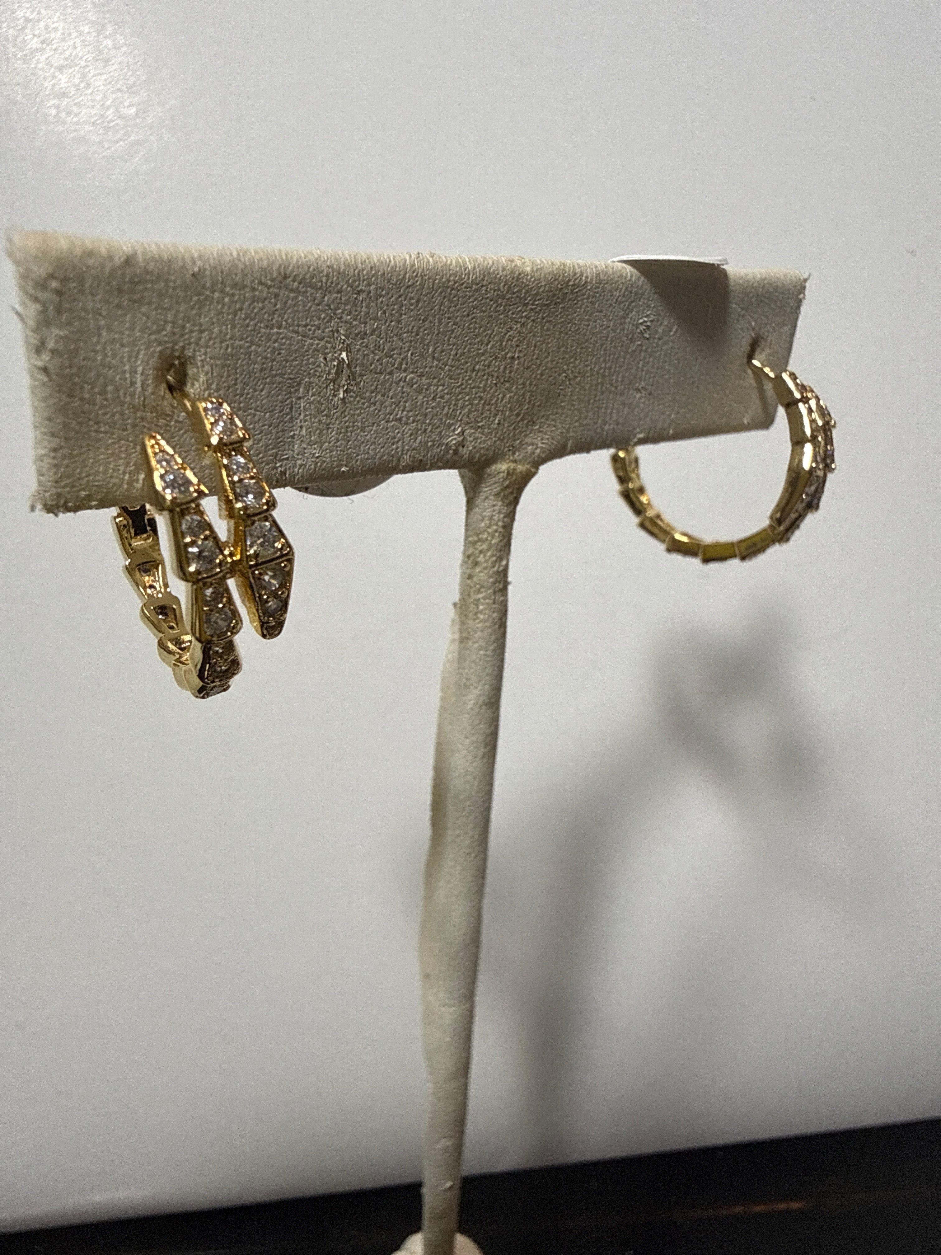 Gold serpent earrings