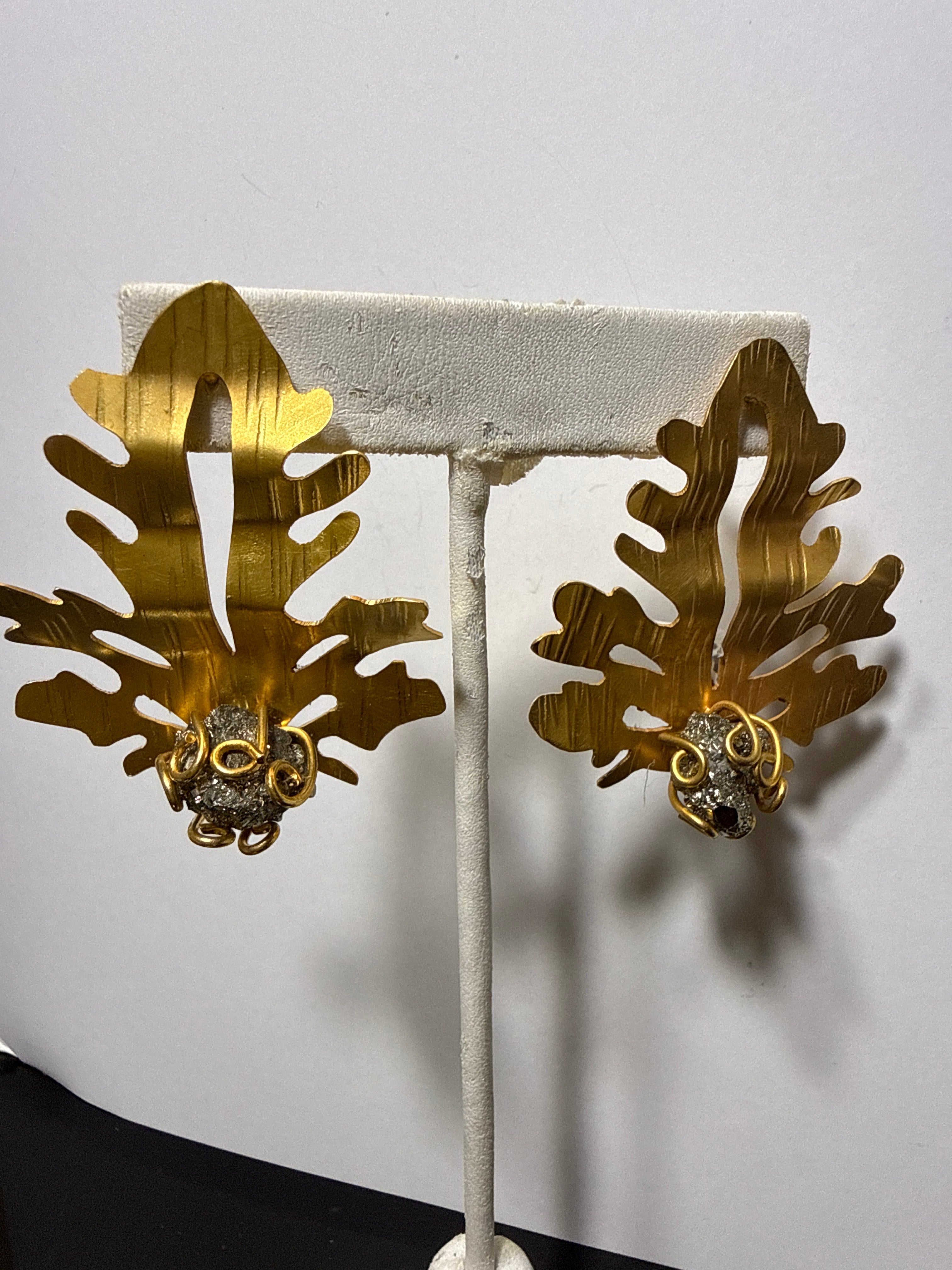 Golden leaves in crusted with Drusey stones