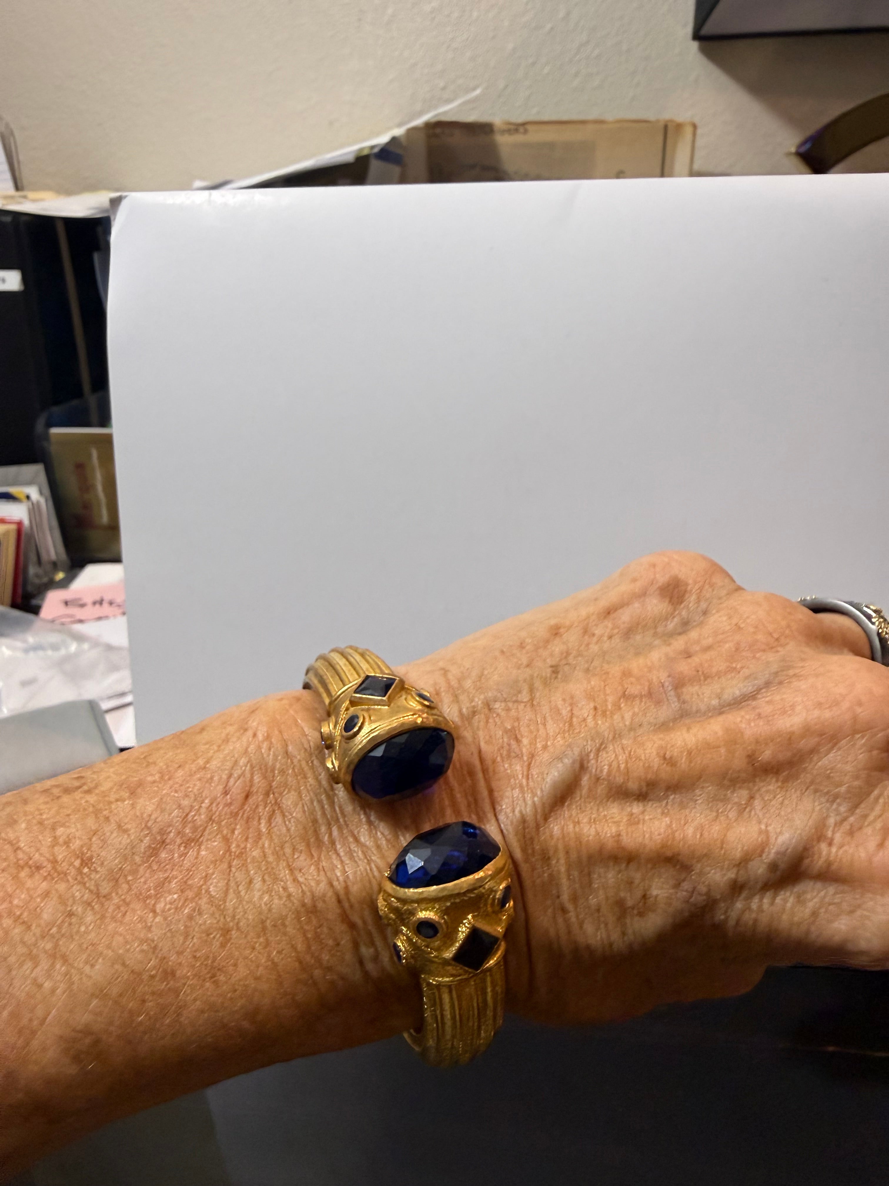 Gold bangle with black Onyx stones