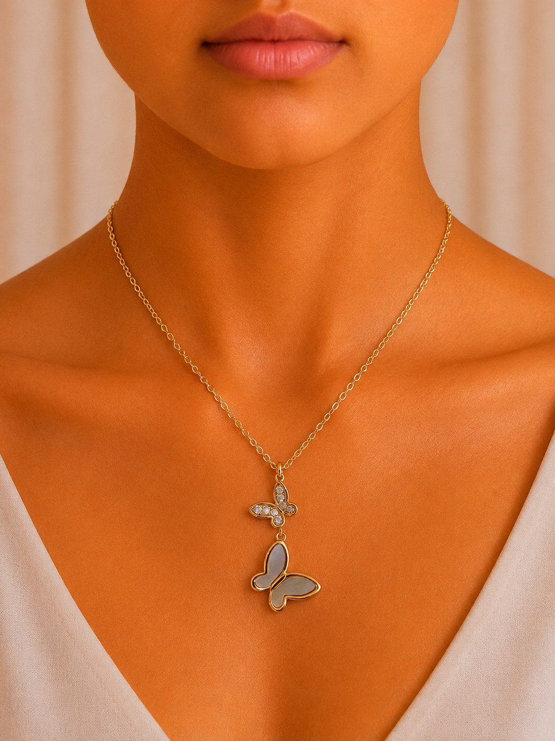 Two Gold Open Butterfly Pendant Necklace