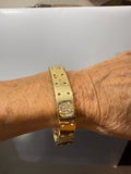 Gold bangle with CZ’s